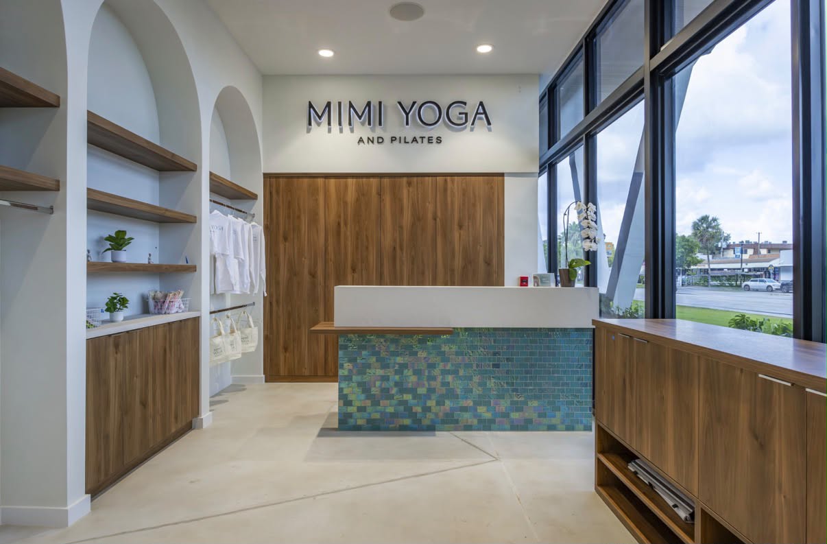 Mimi Yoga and Pilates reception desk built by VCM Builders in North Miami Beach, FL